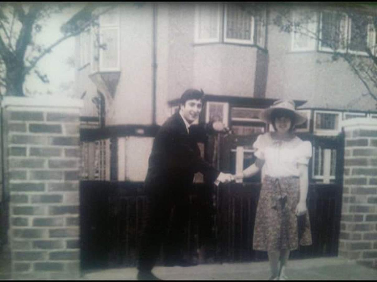 Image may contain: 1 person, on stage, standing and child